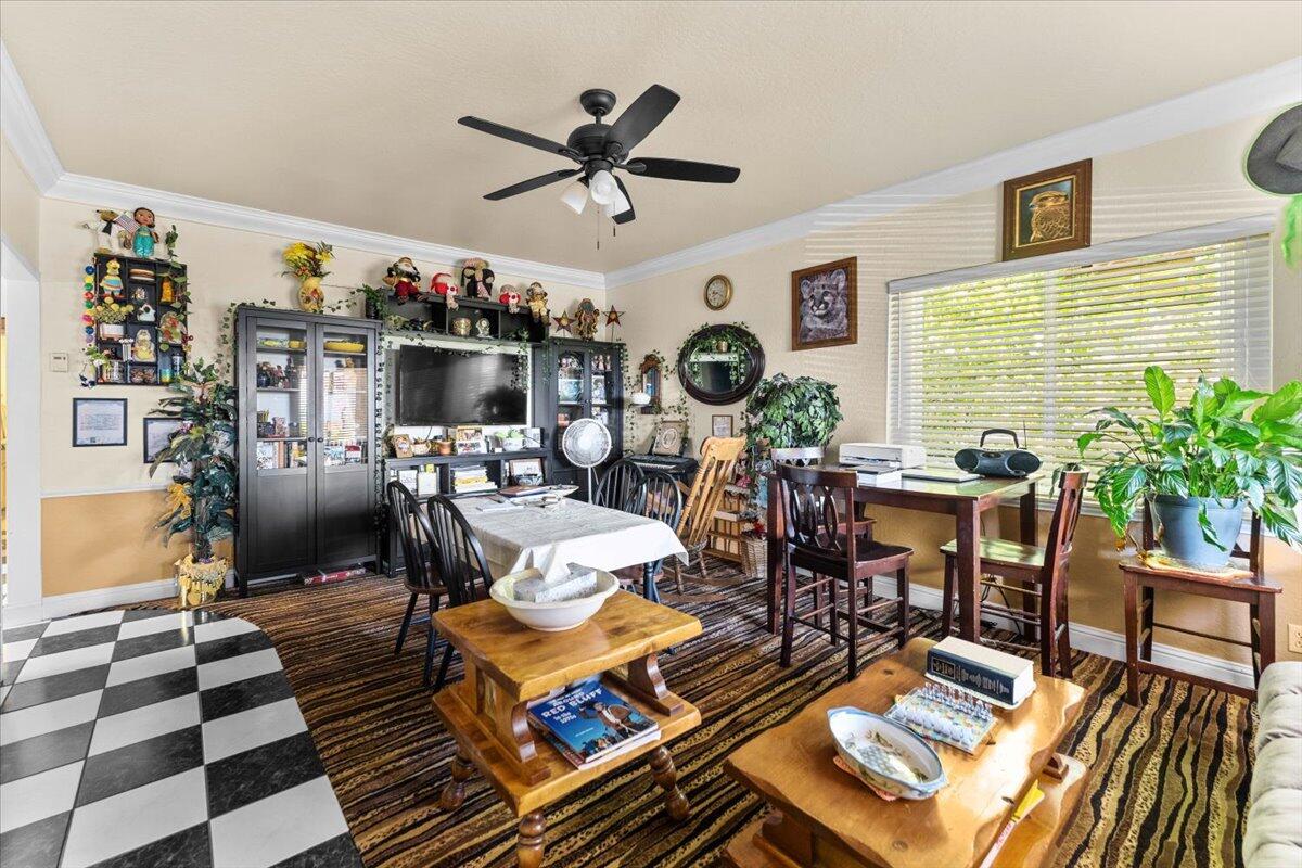 931 Rio Street Red Bluff, CA 96080 - Photo 13 of 54 a living room with furniture and a window