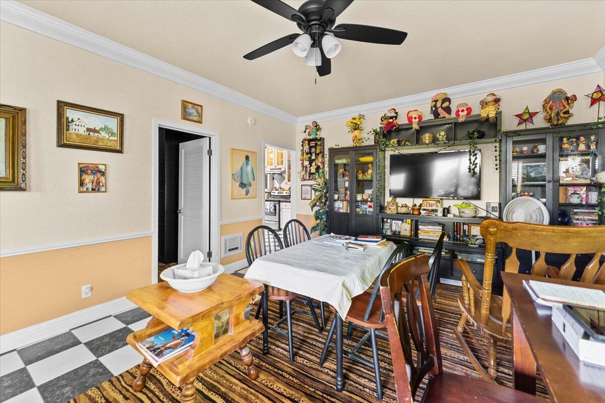 931 Rio Street Red Bluff, CA 96080 - Photo 14 of 54 a view of a dining room with furniture and a kitchen