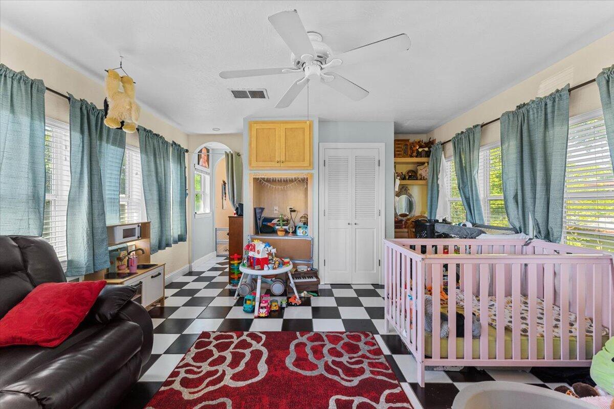 931 Rio Street Red Bluff, CA 96080 - Photo 25 of 54 a bedroom with furniture and a window