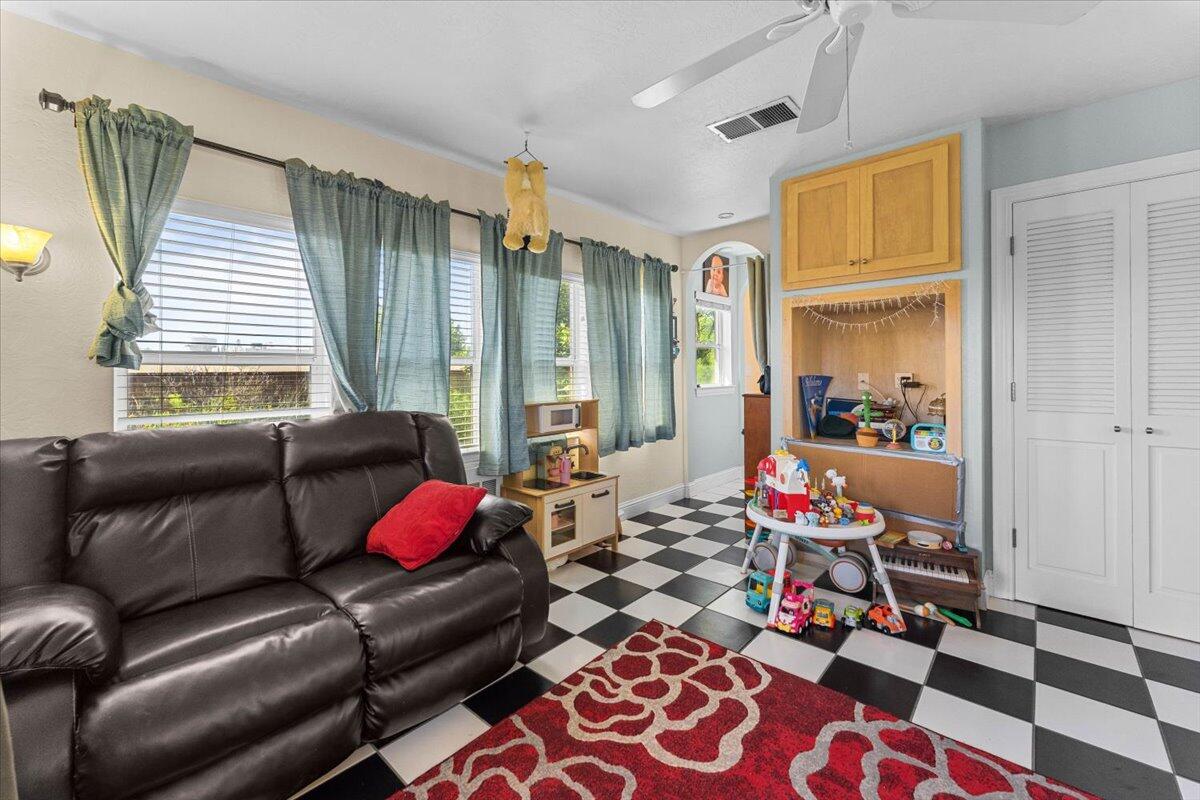 931 Rio Street Red Bluff, CA 96080 - Photo 26 of 54 a living room with furniture and a window