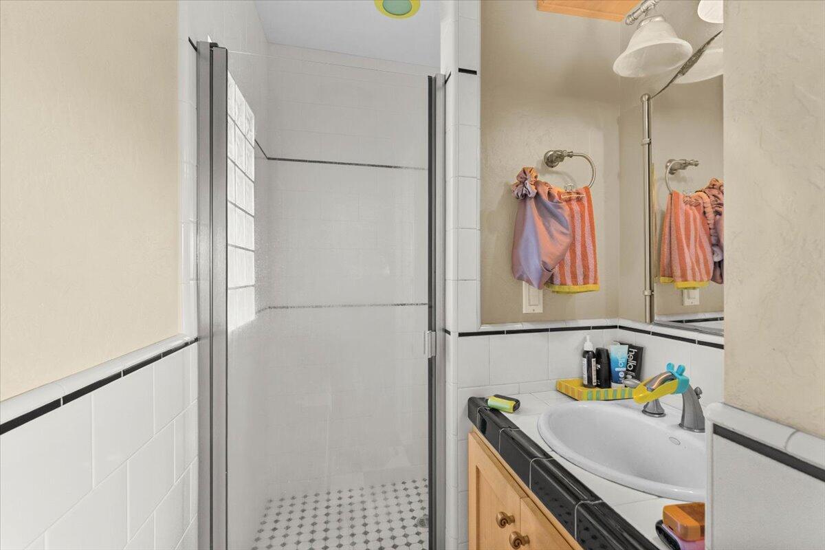 931 Rio Street Red Bluff, CA 96080 - Photo 34 of 54 a bathroom with a sink and a shower