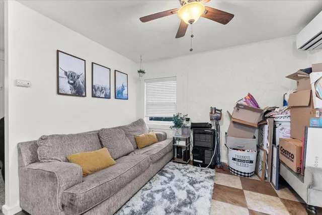 a backyard of a house with lots of green space and outdoor seating