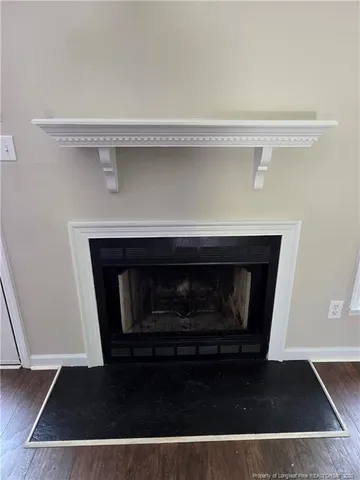 a living room with a fireplace