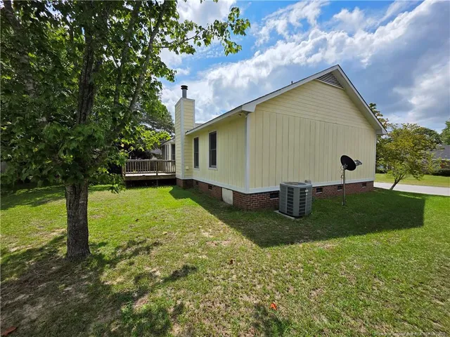 a view of backyard with green space