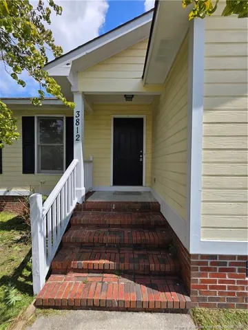 a view of a entryway door front of house