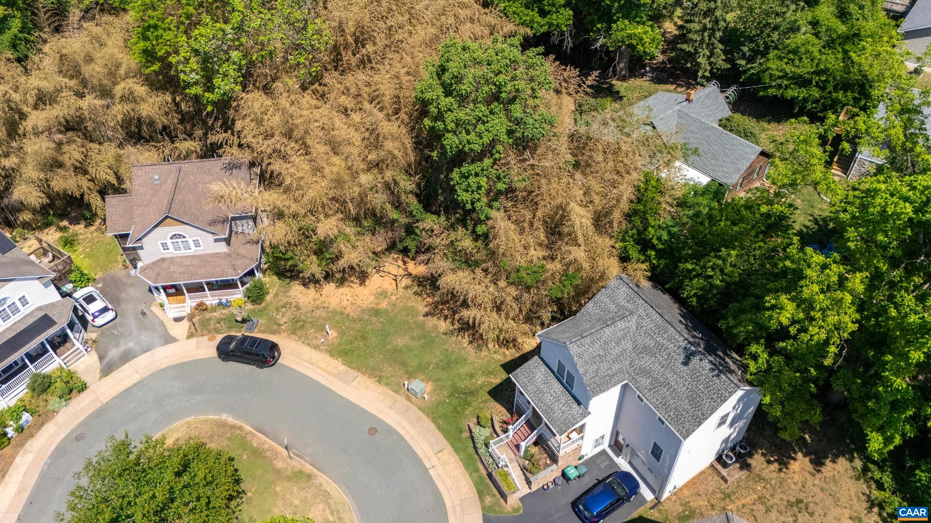 125 Roy's Place Charlottesville, VA 22902 - Photo 14 of 19 an aerial view of a house with a swimming pool