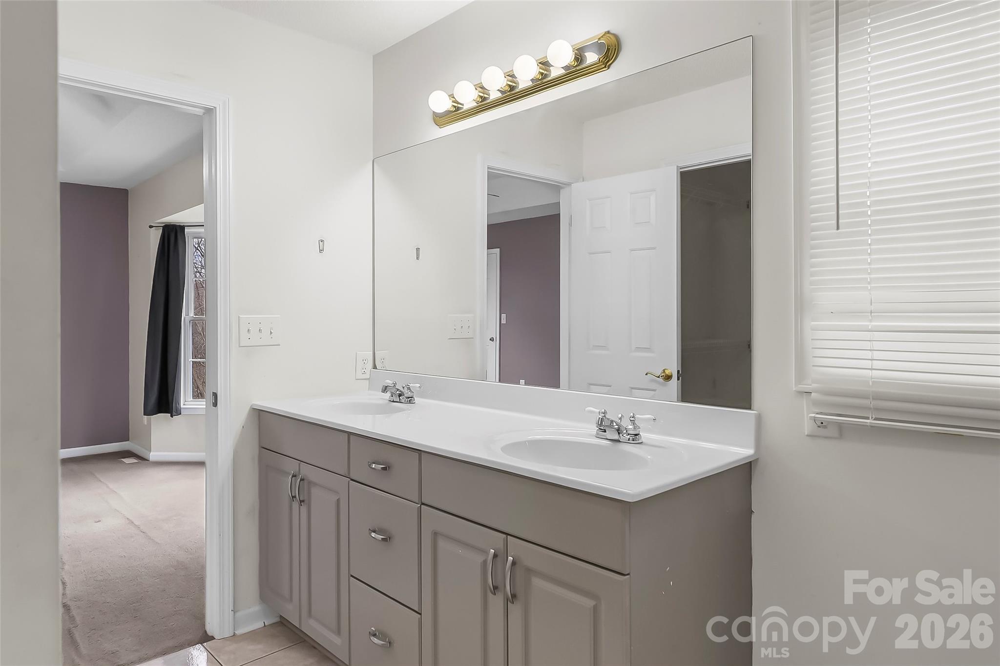 1926 Timber Trace Morganton, NC 28655 - Photo 15 of 36 a bathroom with a sink double vanity and a mirror