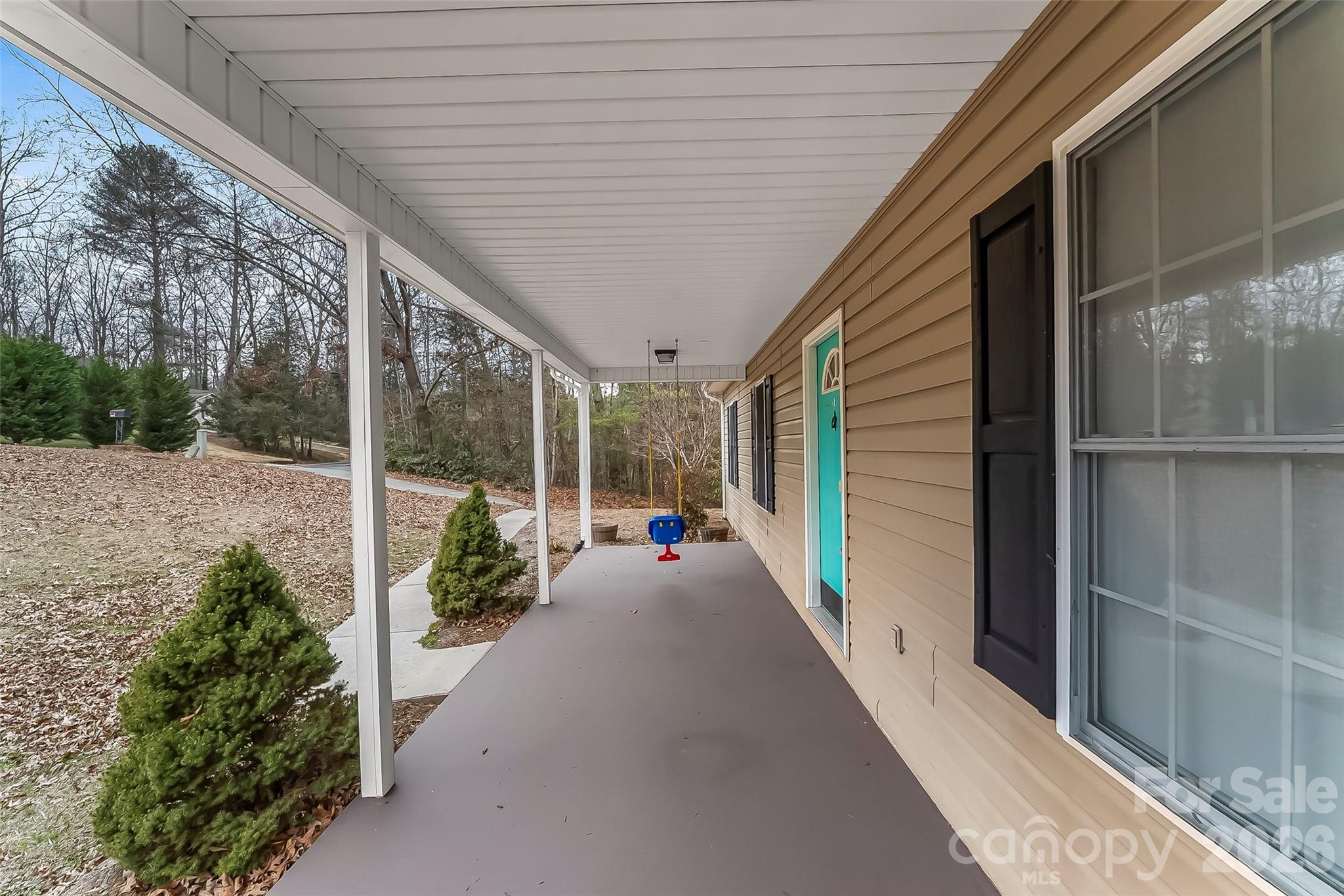 1926 Timber Trace Morganton, NC 28655 - Photo 4 of 36 a view of a porch with furniture