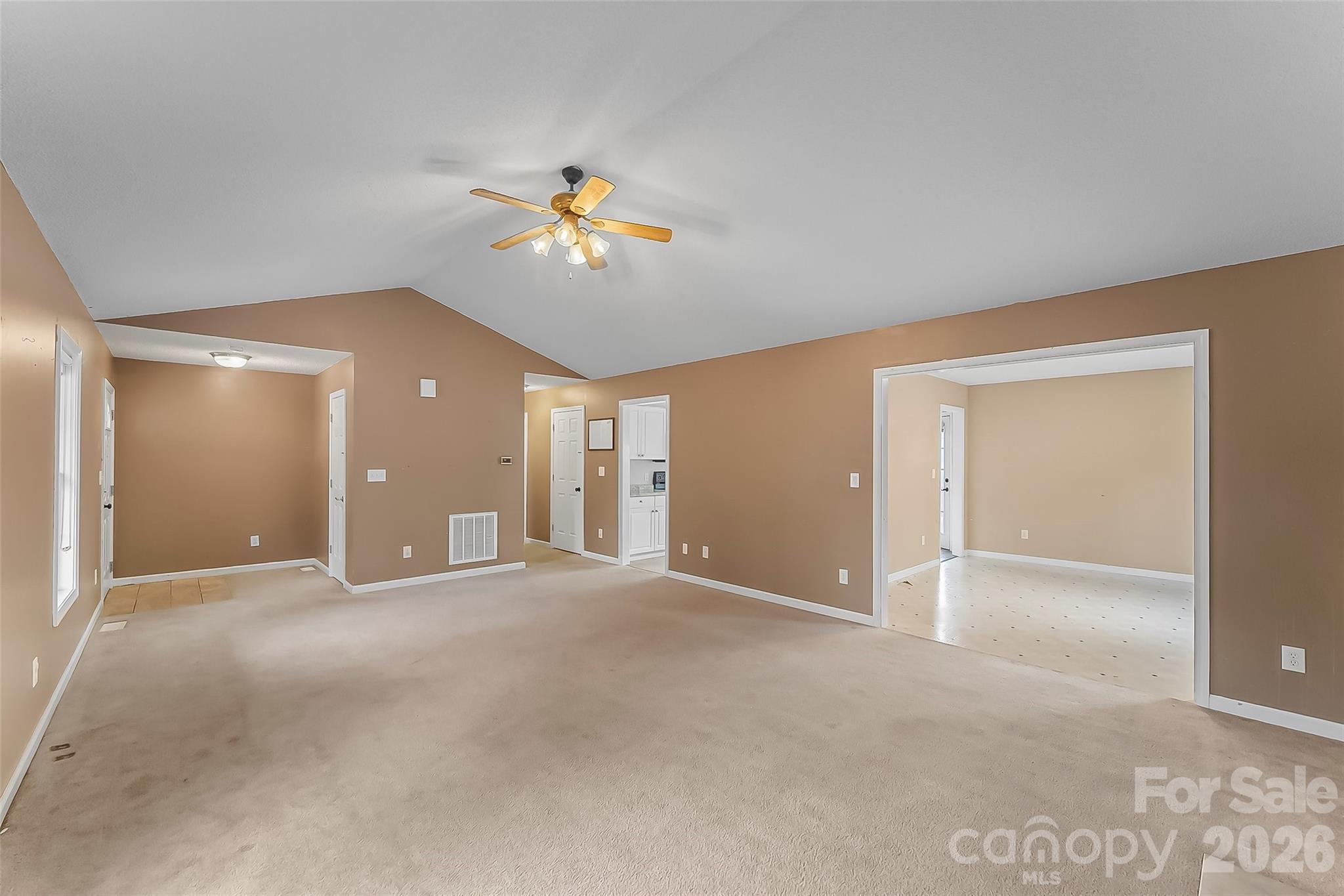 1926 Timber Trace Morganton, NC 28655 - Photo 7 of 36 a view of empty room with a ceiling fan