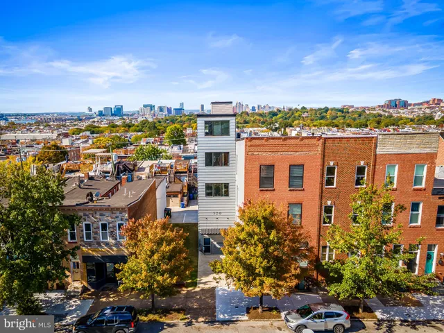 a view of a city with tall buildings