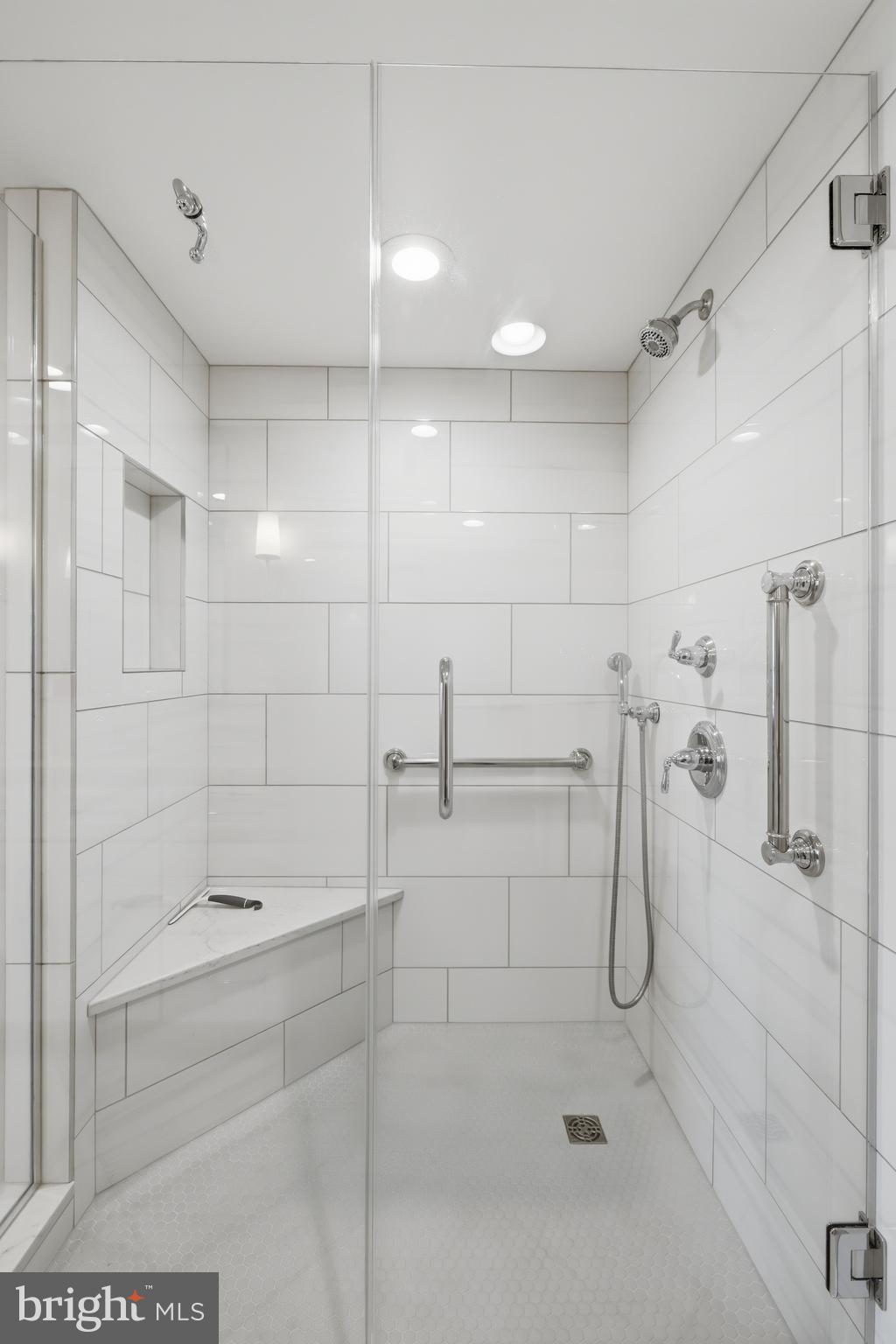 12240 Roundwood Road, Unit 605 Lutherville-Timonium, MD 21093 - Photo 16 of 38 Step in Shower with glass surround for great light