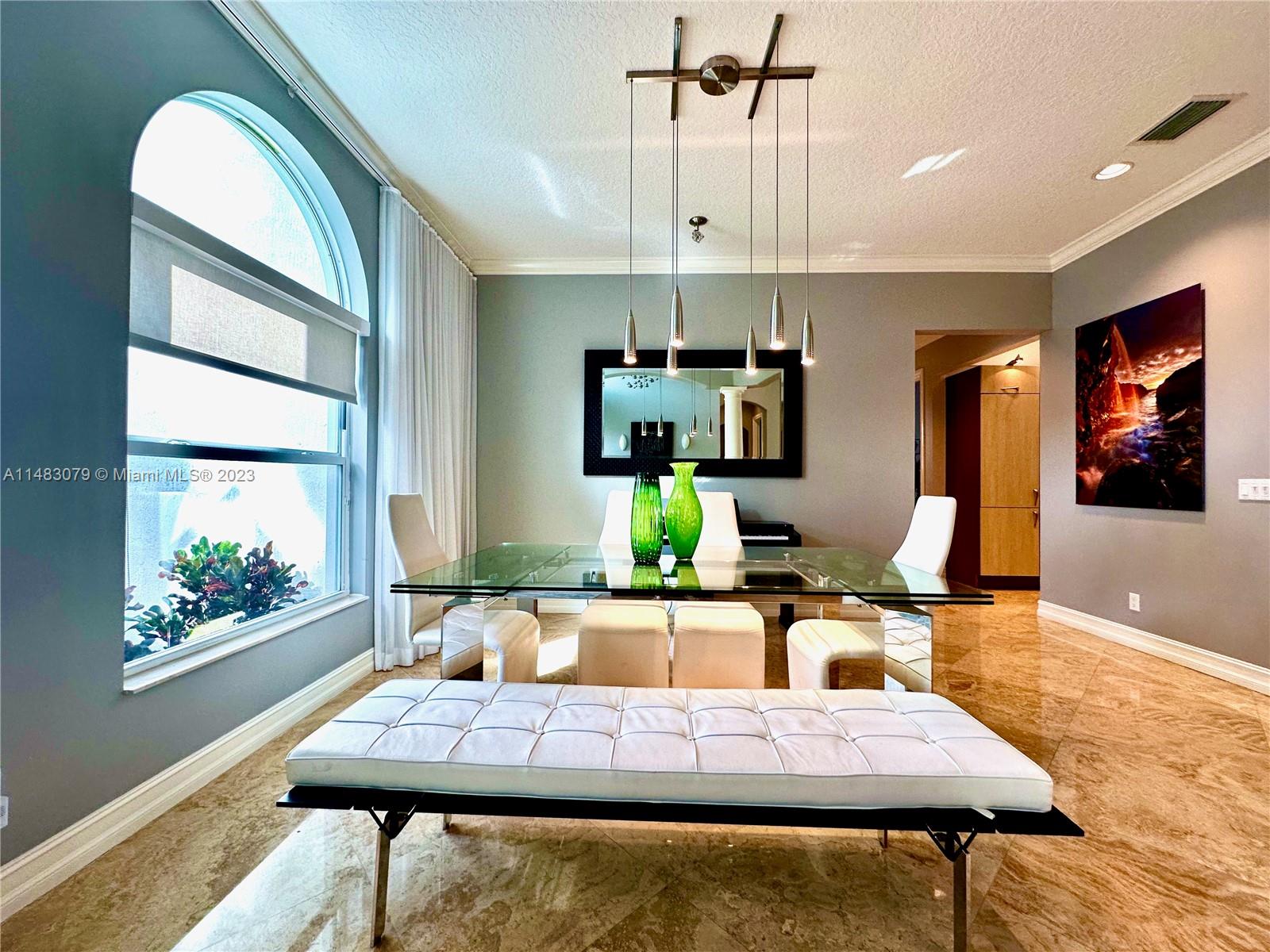 465 Northeast 2nd Street Boca Raton, FL 33432 - Photo 11 of 73 a living room with furniture and a large window