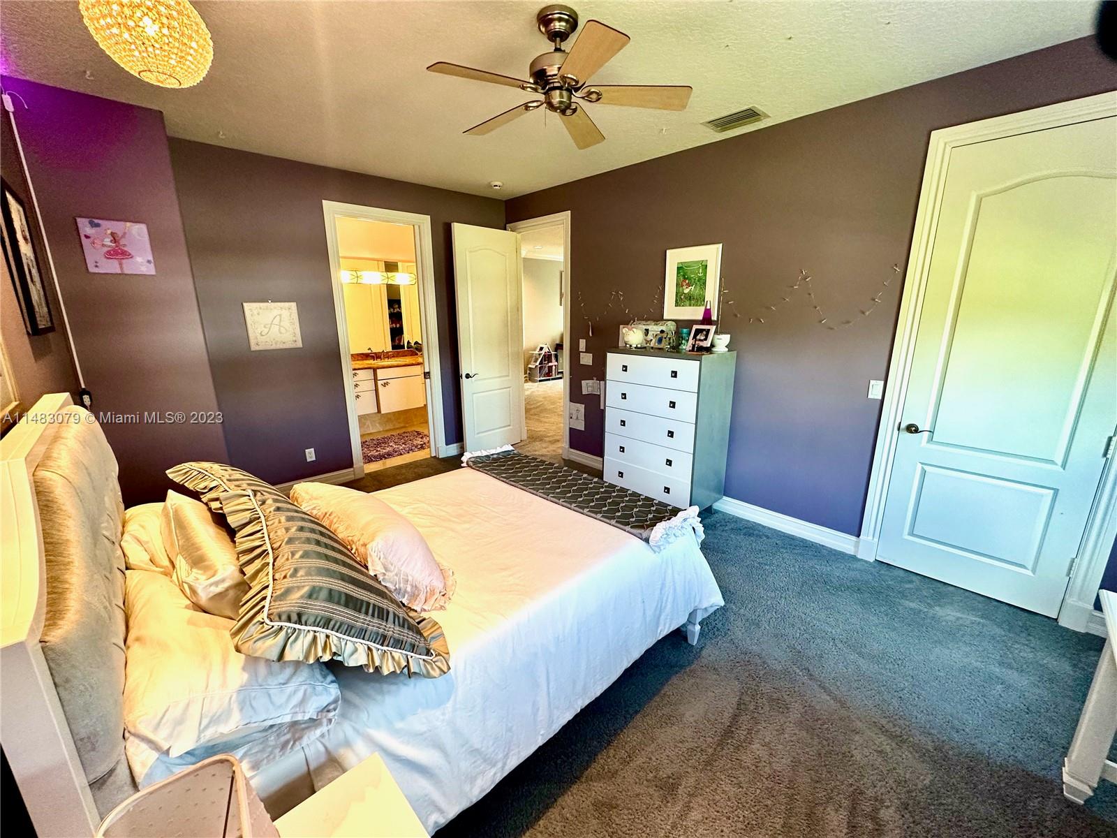 465 Northeast 2nd Street Boca Raton, FL 33432 - Photo 52 of 73 a bedroom with a bed dresser and a window