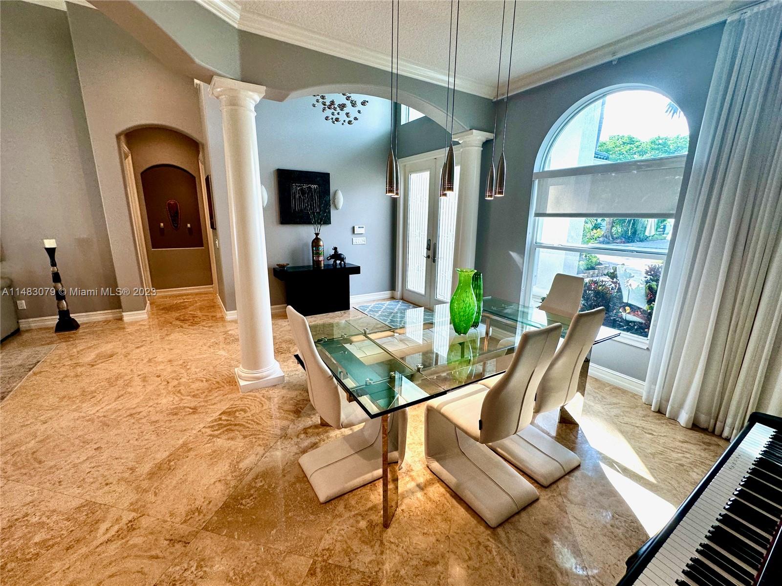 465 Northeast 2nd Street Boca Raton, FL 33432 - Photo 9 of 73 a view of a livingroom with furniture window and wooden floor