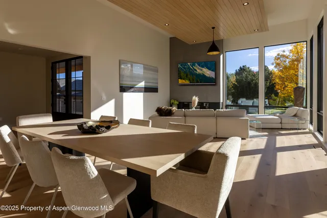 a kitchen that has a sink and a large window