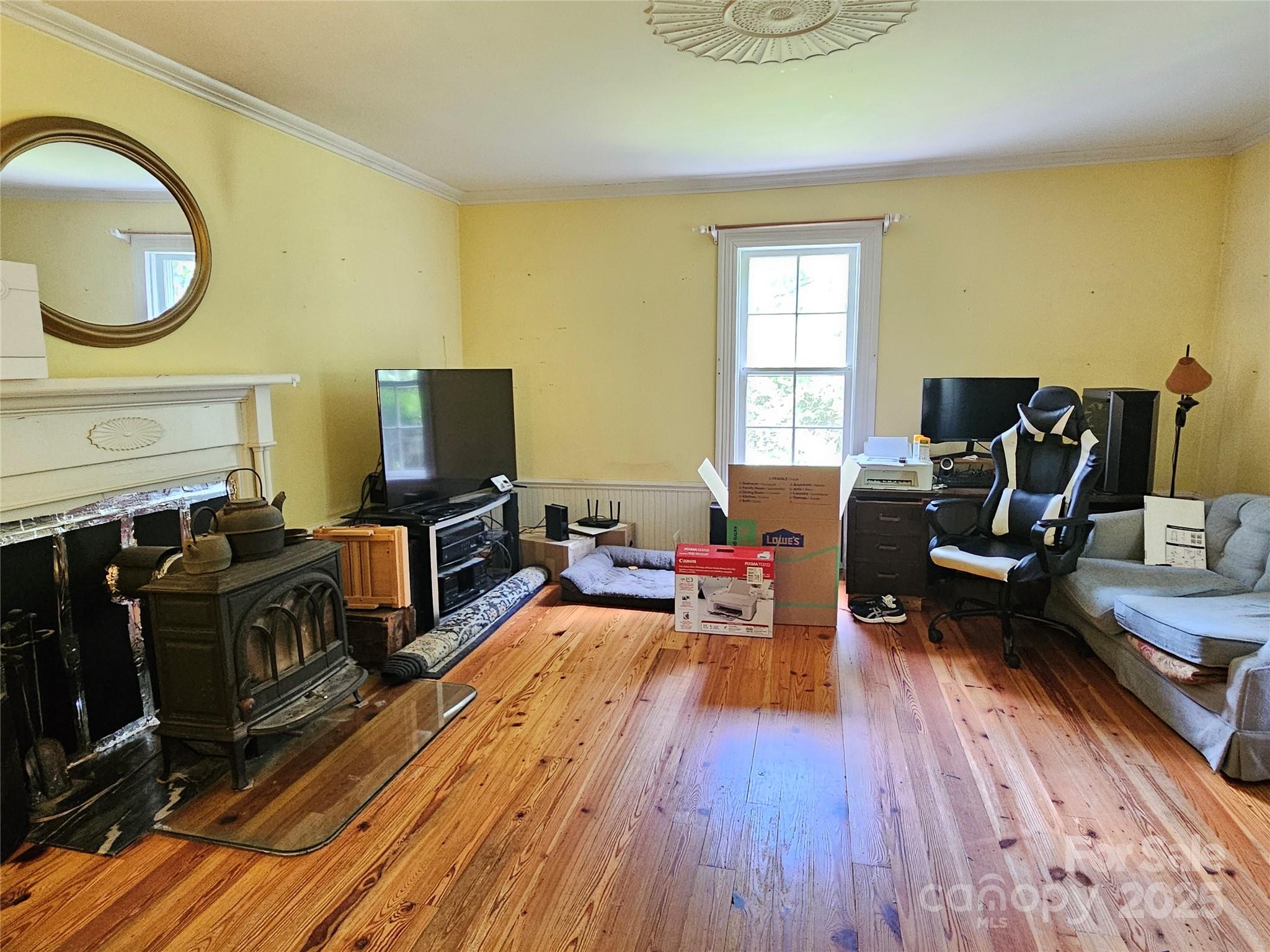 368 Settlemyre Road Morganton, NC 28655 - Photo 13 of 47 a living room with furniture and a flat screen tv