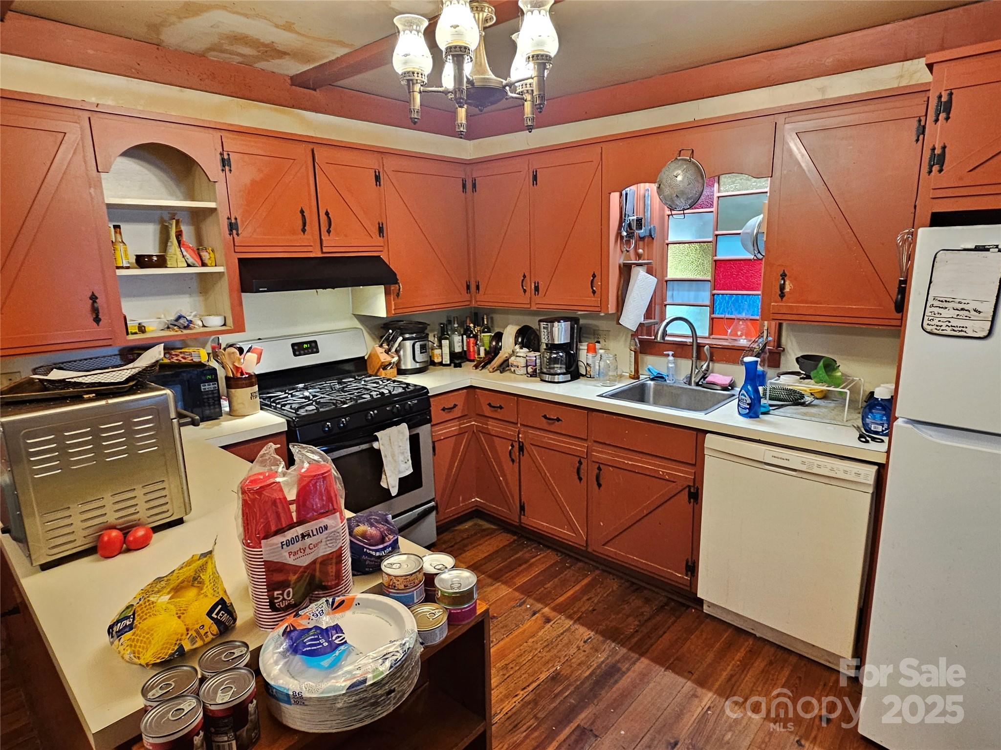 368 Settlemyre Road Morganton, NC 28655 - Photo 17 of 47 a kitchen with a sink stove and cabinets