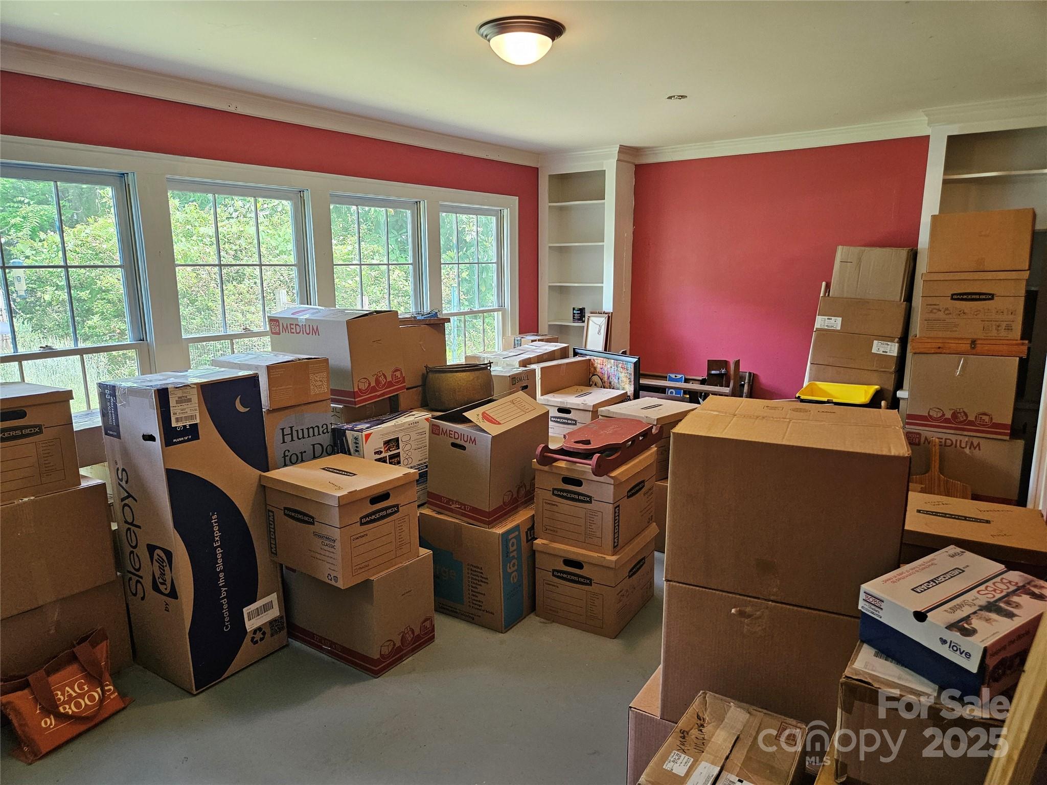 368 Settlemyre Road Morganton, NC 28655 - Photo 22 of 47 a view of a workspace with furniture and a window