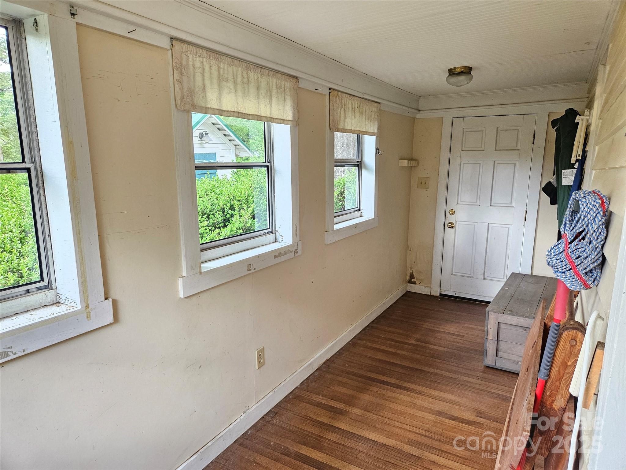 368 Settlemyre Road Morganton, NC 28655 - Photo 24 of 47 a view of a livingroom with wooden floor and a window
