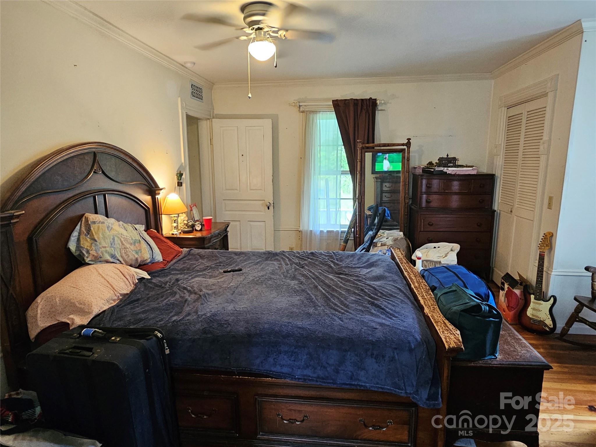 368 Settlemyre Road Morganton, NC 28655 - Photo 26 of 47 a bedroom with bed and a dresser