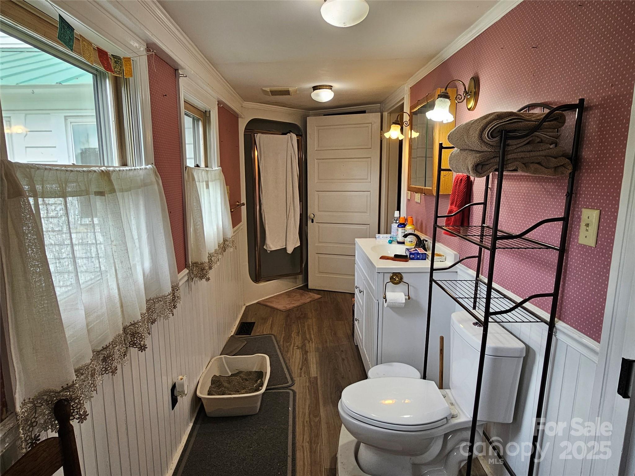 368 Settlemyre Road Morganton, NC 28655 - Photo 27 of 47 a bathroom with a toilet a sink and shower