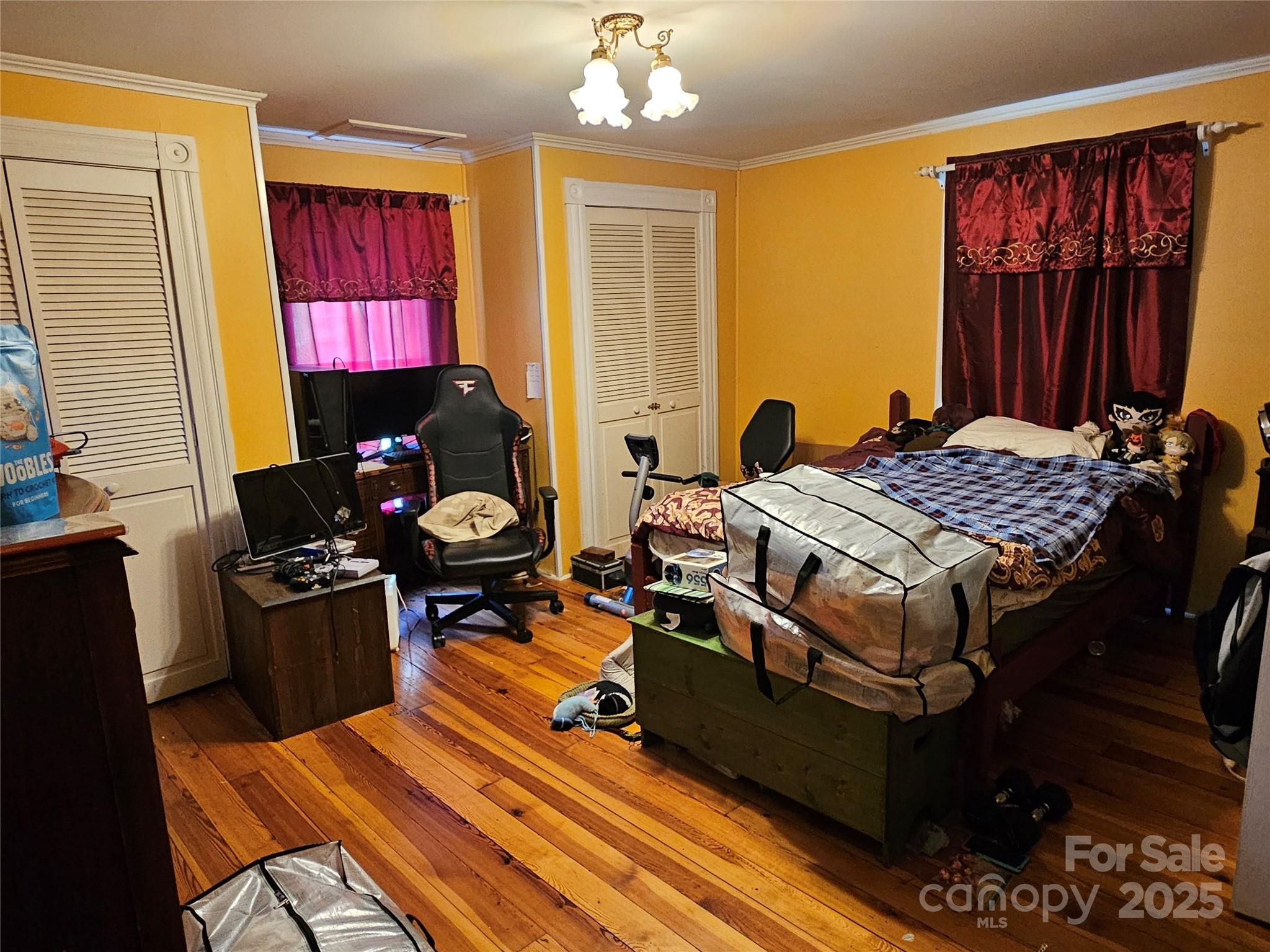 368 Settlemyre Road Morganton, NC 28655 - Photo 32 of 47 a bedroom with bed and a window