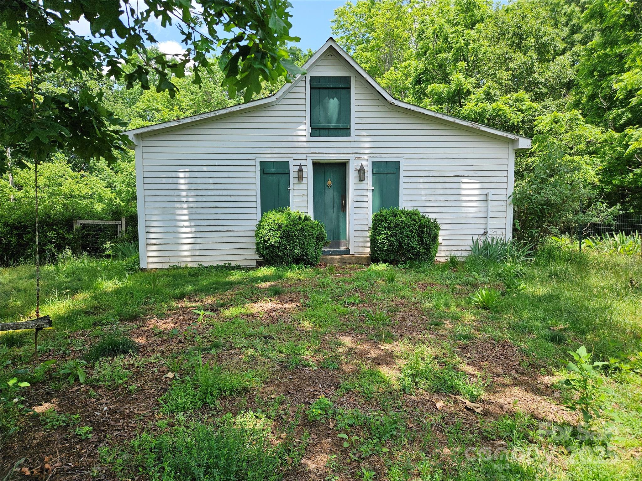 368 Settlemyre Road Morganton, NC 28655 - Photo 34 of 47 a view of a house with yard and plants