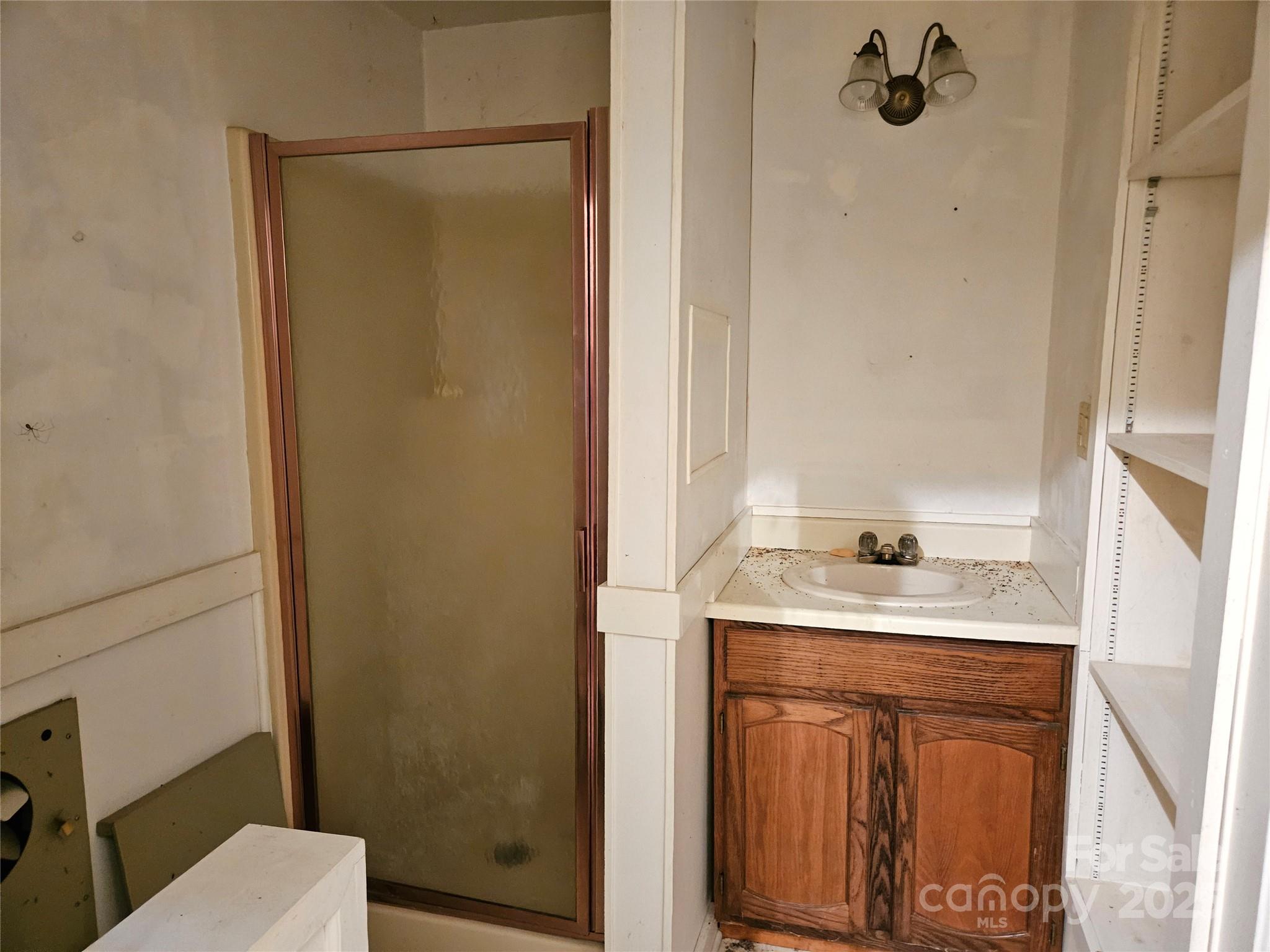 368 Settlemyre Road Morganton, NC 28655 - Photo 38 of 47 a bathroom with a sink a toilet and shower