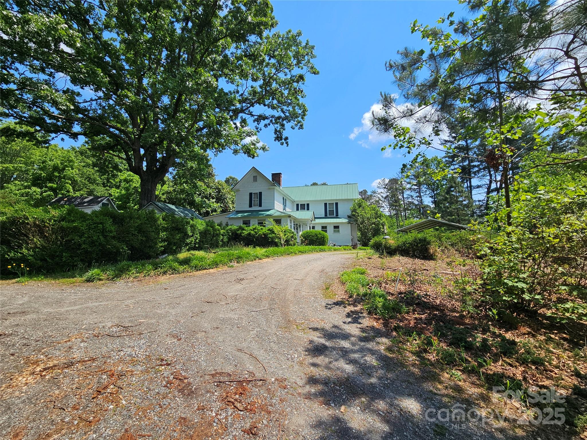 368 Settlemyre Road Morganton, NC 28655 - Photo 4 of 47 a view of a house with a street