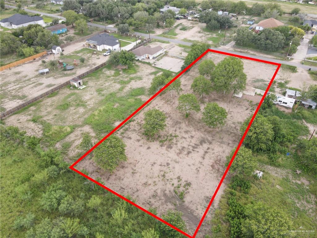 1713 Cheril Road Mission, TX 78573 - Photo 6 of 6 a view of a yard with a flat screen tv