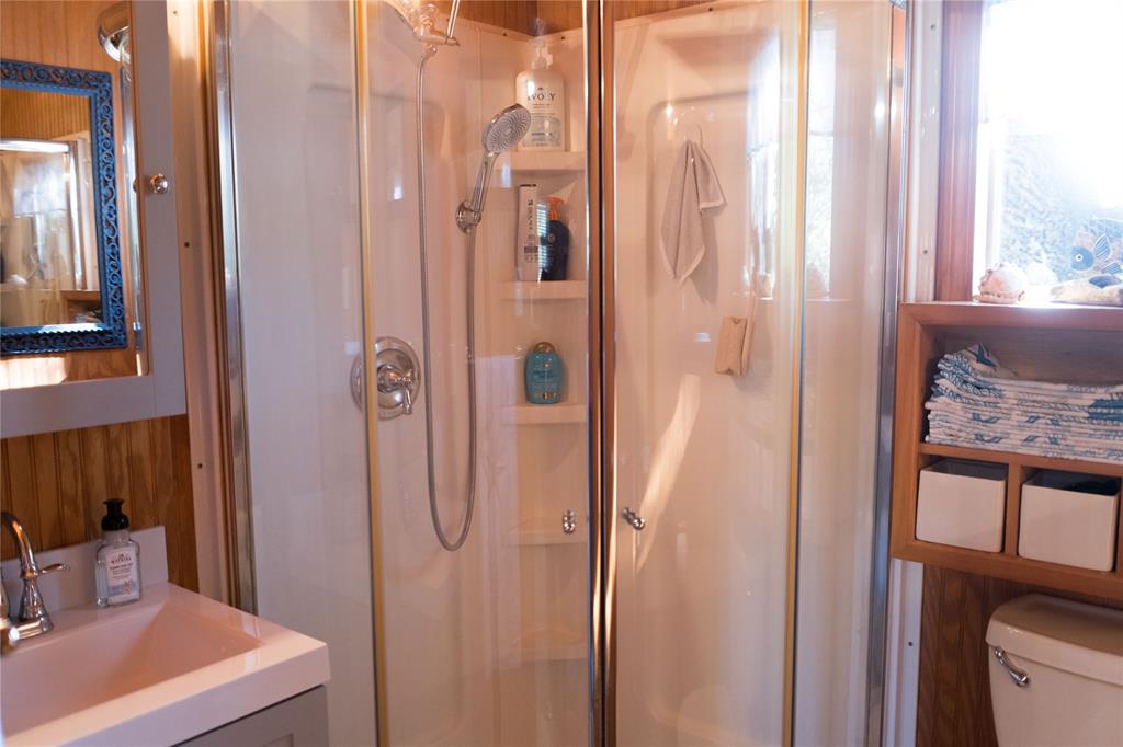 1597 County Road 305 Zephyr, TX 76890 - Photo 11 of 40 a bathroom with a shower