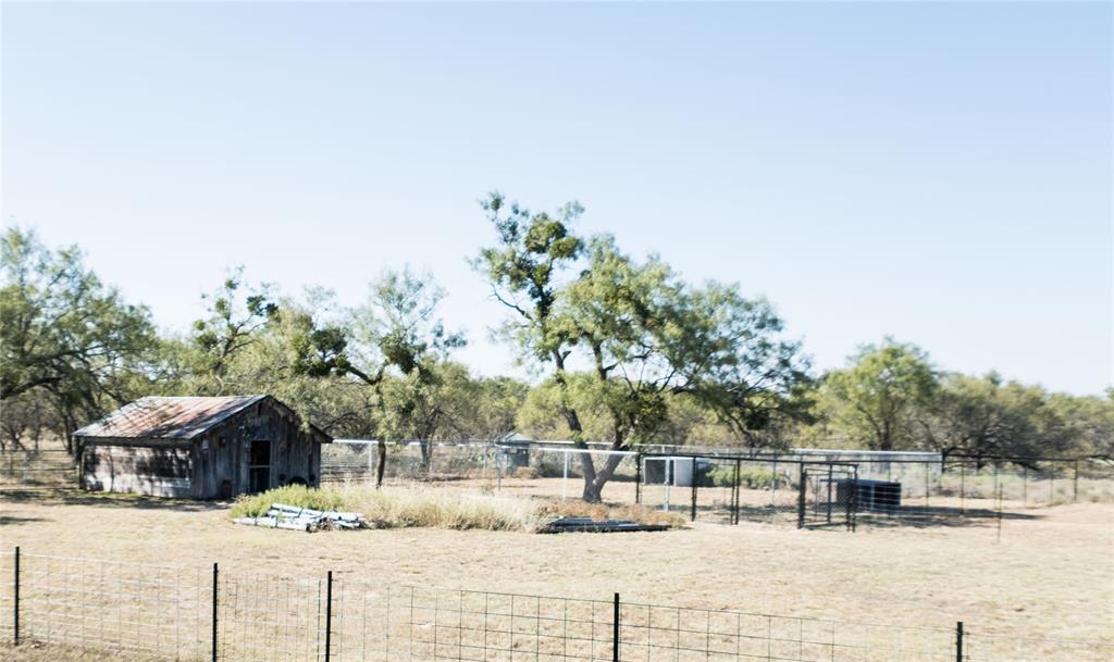 1597 County Road 305 Zephyr, TX 76890 - Photo 12 of 40 a view of a house with snow on the road