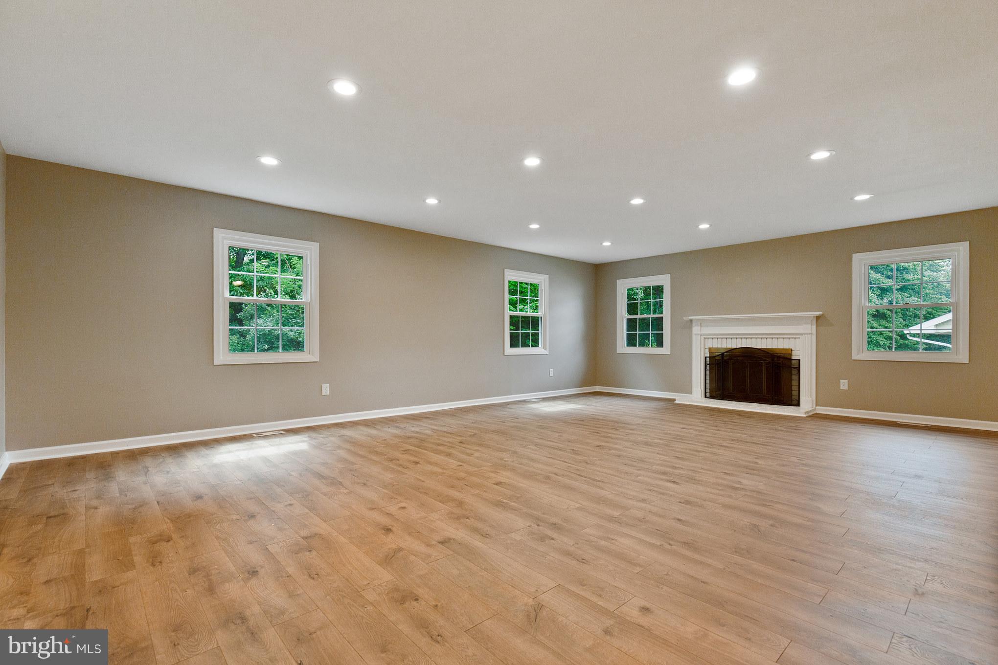 8803 Oxwell Lane Laurel, MD 20708 - Photo 5 of 30 Living Room with Wood Burning FP