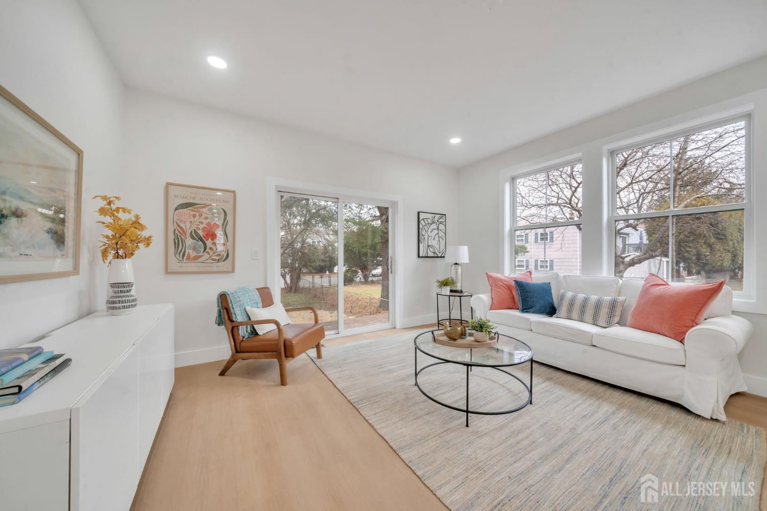 66 Garden Terrace Edison, NJ 08817 - Photo 17 of 40 a living room with furniture and a large window