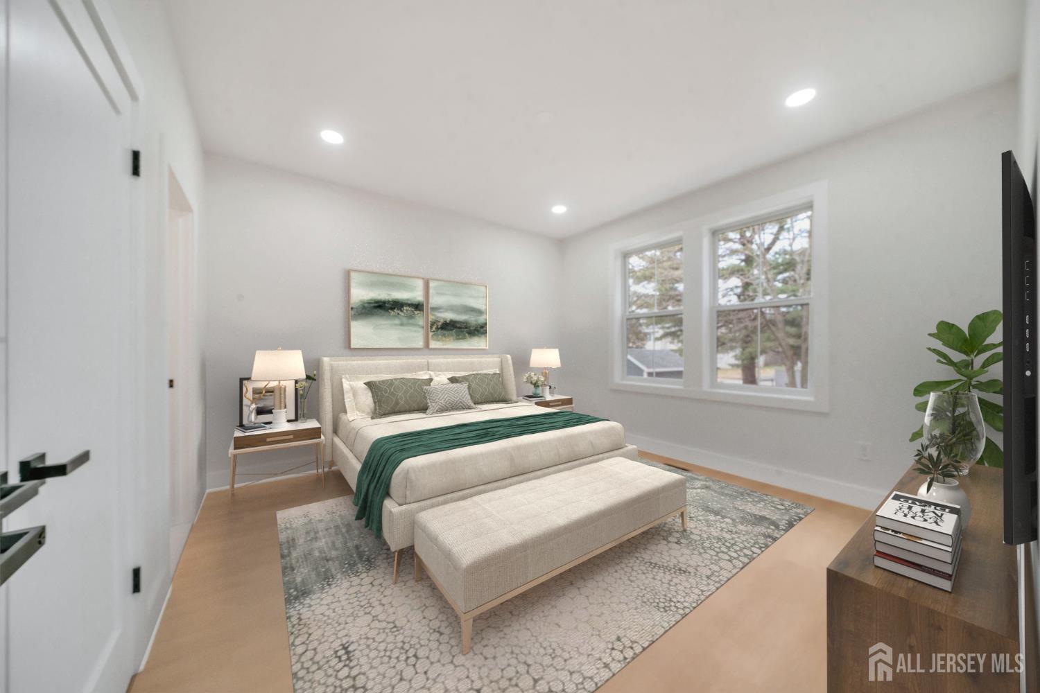 66 Garden Terrace Edison, NJ 08817 - Photo 20 of 40 a bedroom with a bed and a window