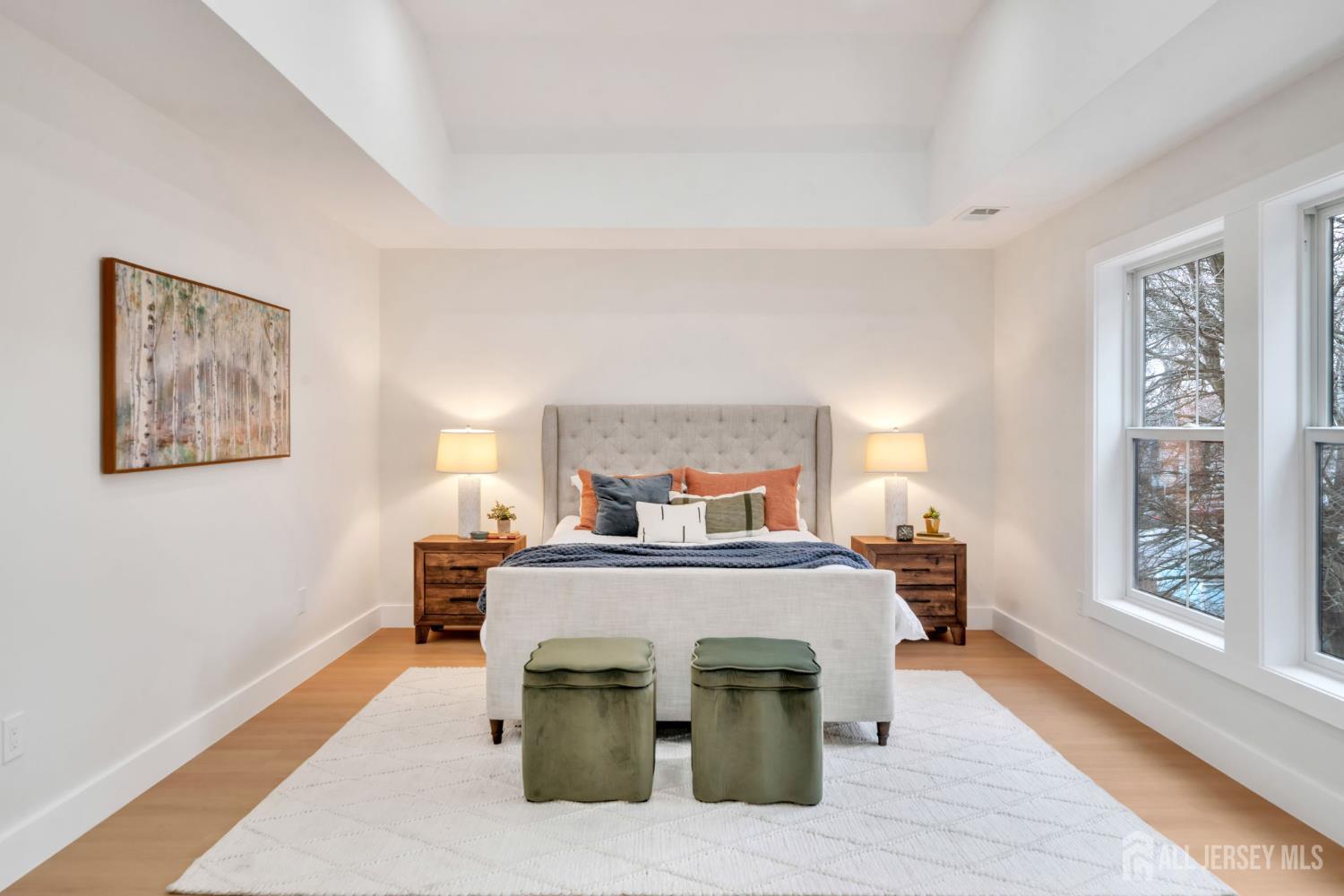 66 Garden Terrace Edison, NJ 08817 - Photo 23 of 40 a bedroom with a bed and wooden floor