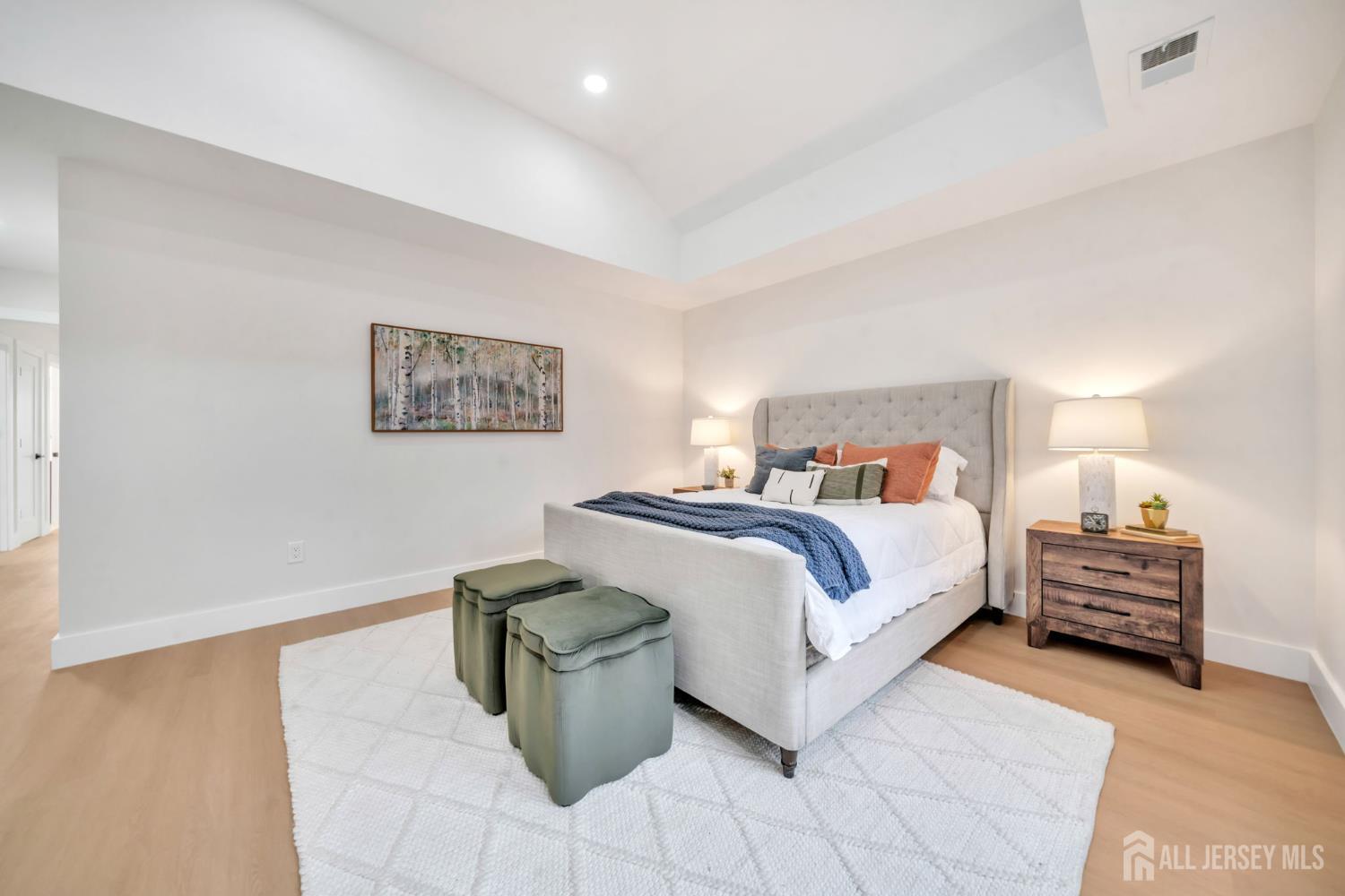 66 Garden Terrace Edison, NJ 08817 - Photo 24 of 40 a bedroom with bed and a night stand