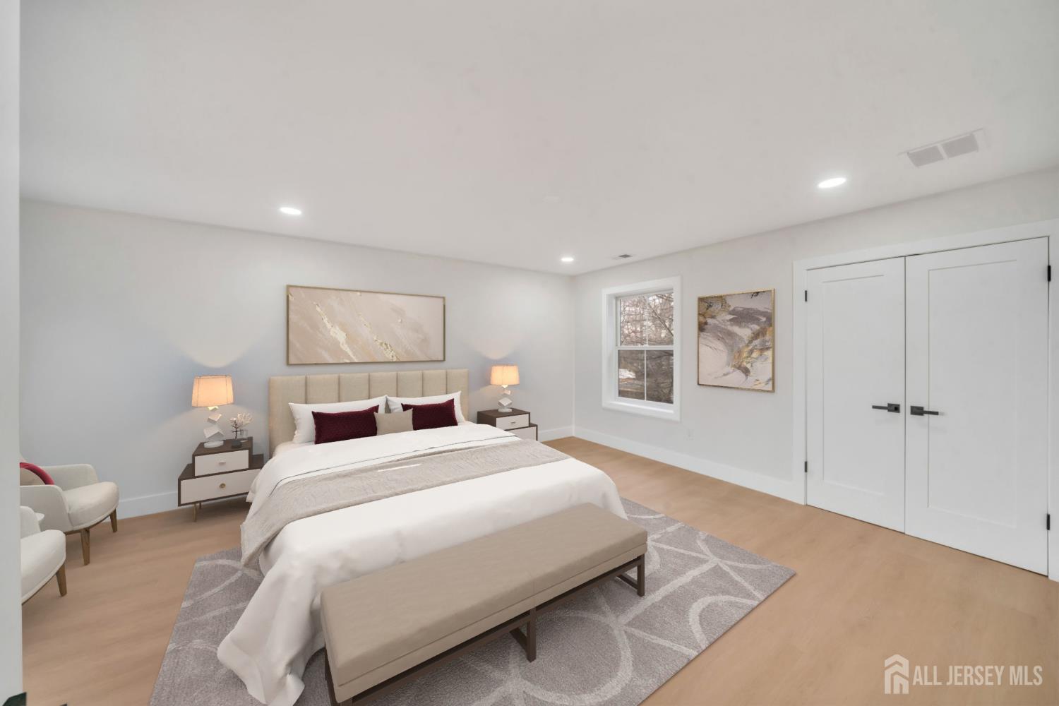 66 Garden Terrace Edison, NJ 08817 - Photo 32 of 40 a spacious bedroom with a bed and a painting on the wall