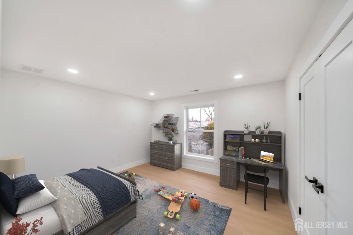 66 Garden Terrace Edison, NJ 08817 - Photo 33 of 40 a bedroom with a bed and furniture