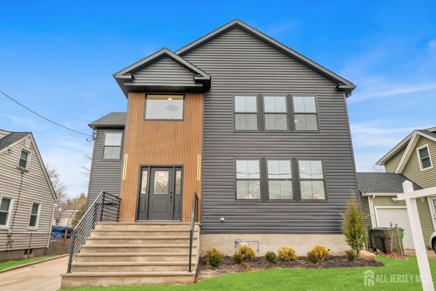 66 Garden Terrace Edison, NJ 08817 - Photo 4 of 40 a front view of a house with garden