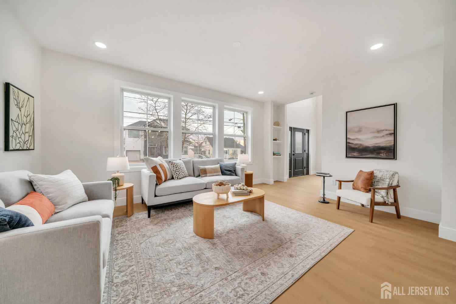 66 Garden Terrace Edison, NJ 08817 - Photo 6 of 40 a living room with furniture and a large window