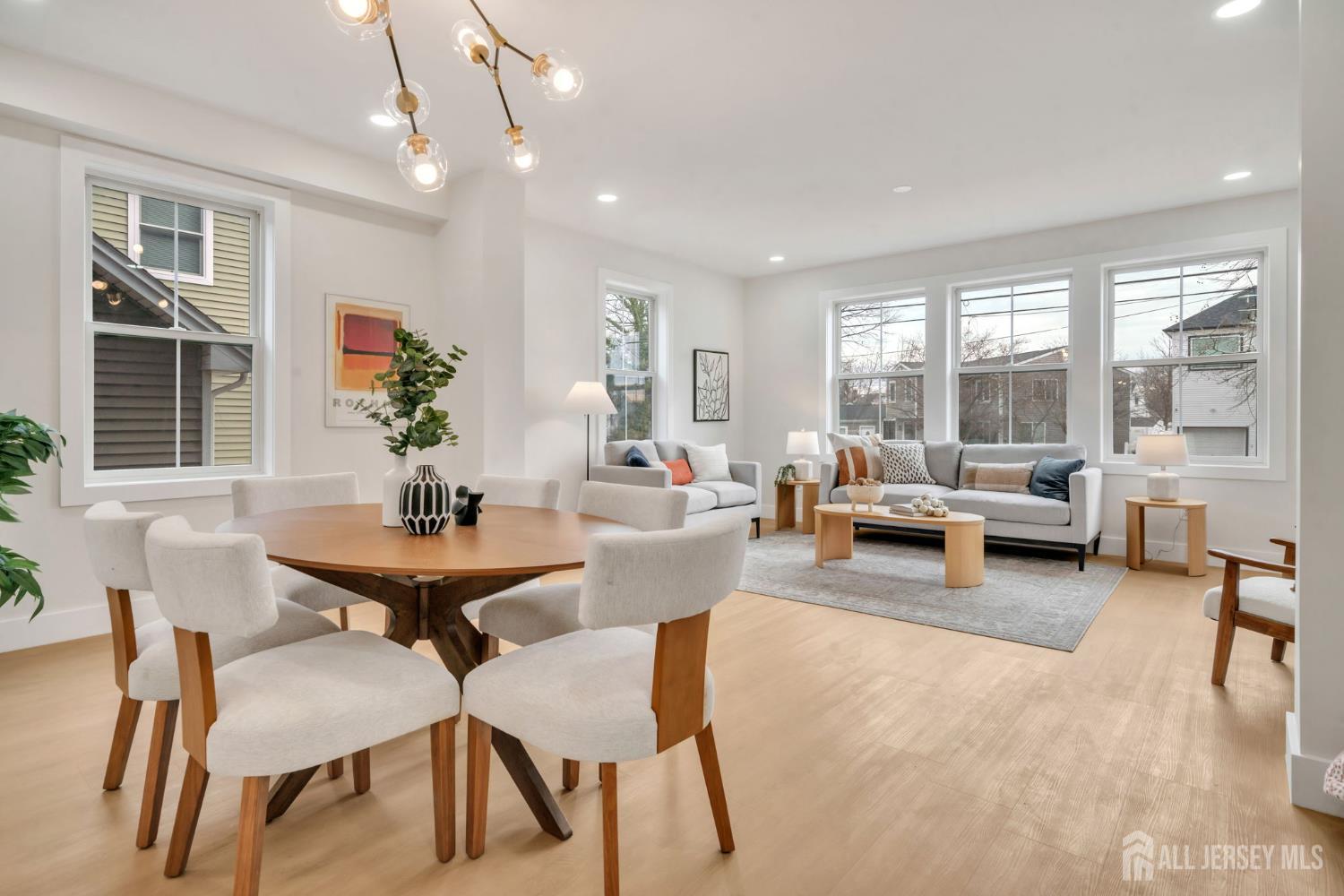 66 Garden Terrace Edison, NJ 08817 - Photo 8 of 40 a living room with furniture and a large window