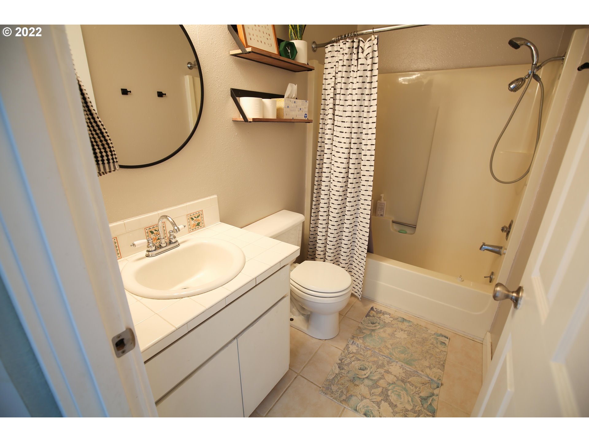 1071 Cole Way Springfield, OR 97478 - Photo 19 of 30 a bathroom with a sink toilet and shower