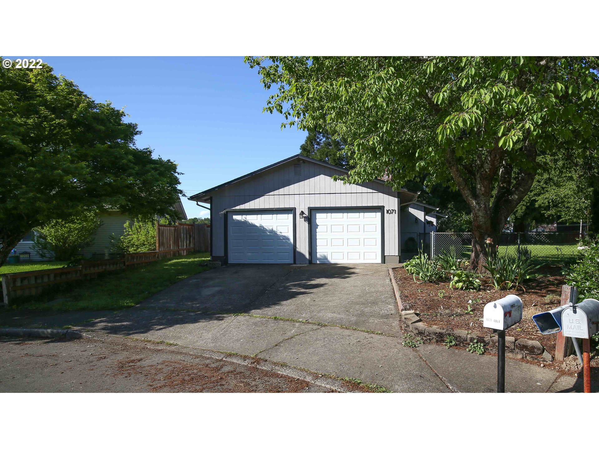 1071 Cole Way Springfield, OR 97478 - Photo 28 of 30 a black and white photo of a house