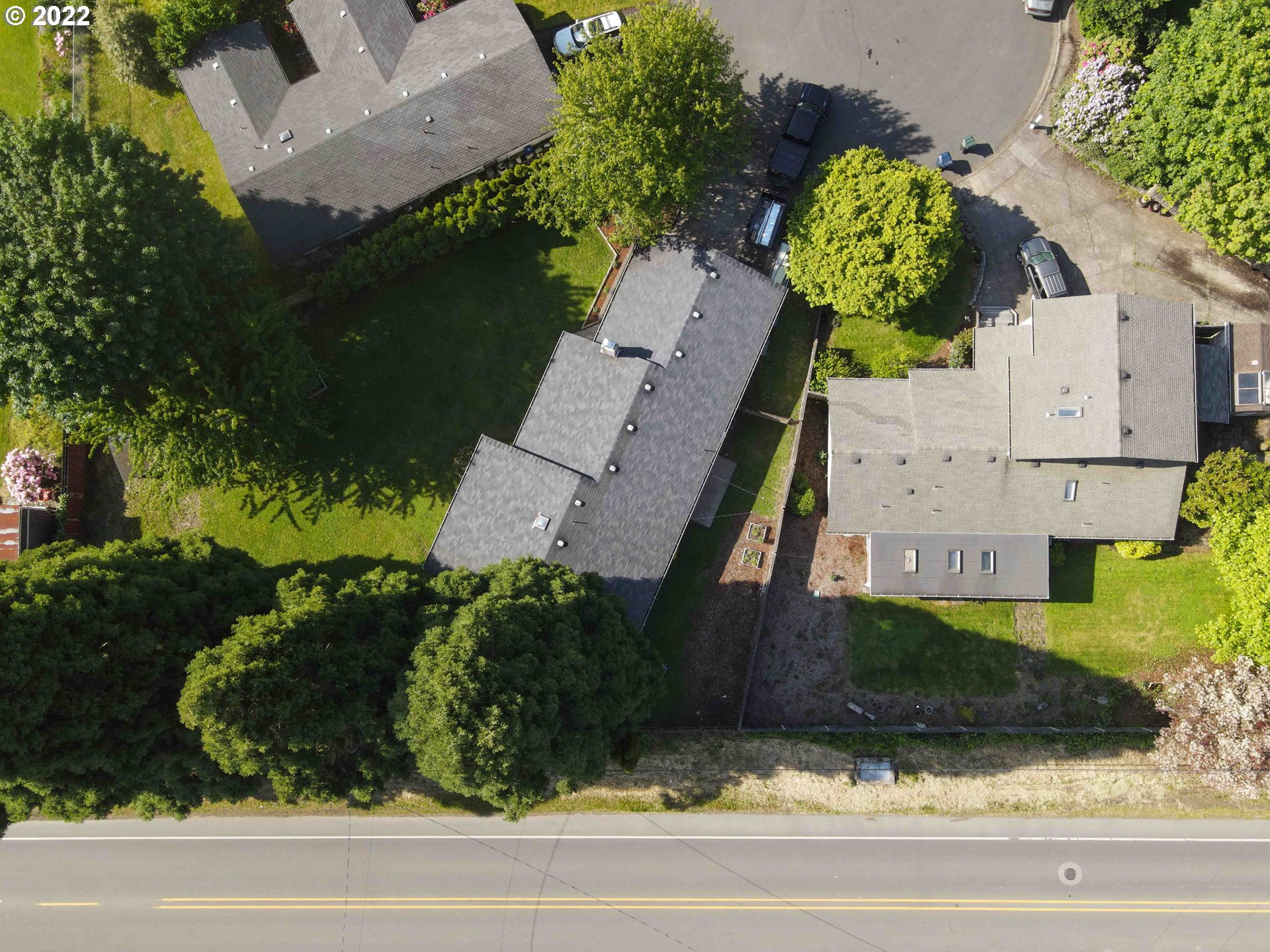 1071 Cole Way Springfield, OR 97478 - Photo 30 of 30 an aerial view of a house with a yard and a garage