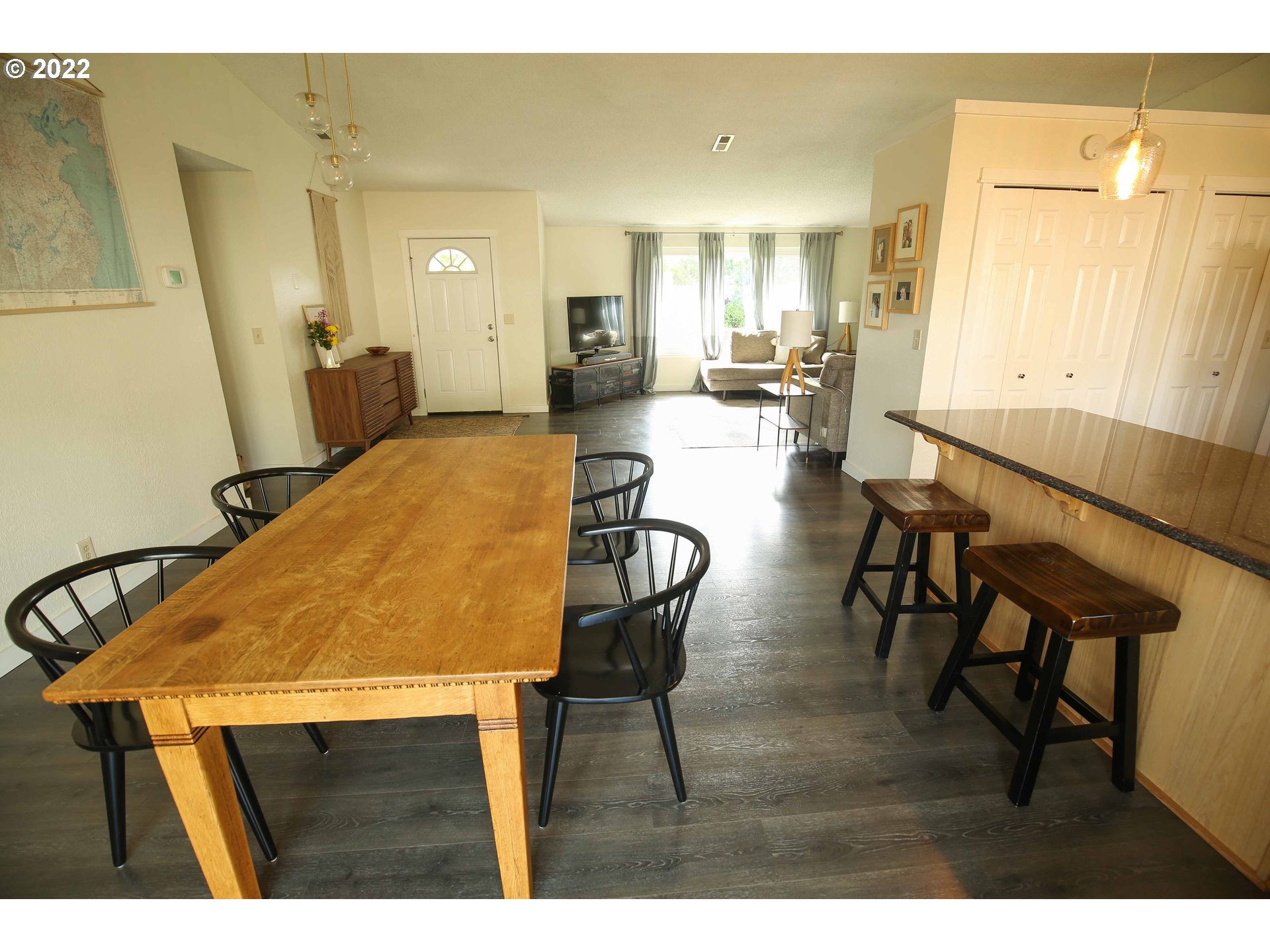 1071 Cole Way Springfield, OR 97478 - Photo 10 of 30 a view of a dining room with furniture and wooden floor