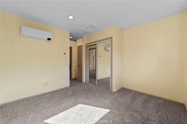 a view of a building with a yard