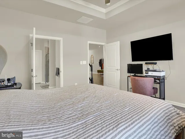 a bathroom with a double vanity sink and mirror