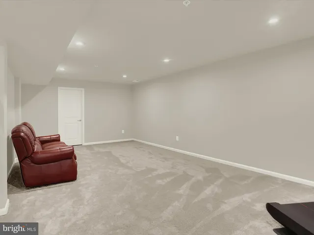 a living room with furniture gym equipment and a view of living room