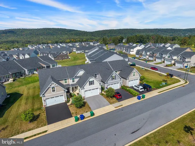 a view of a swimming pool with an ocean view